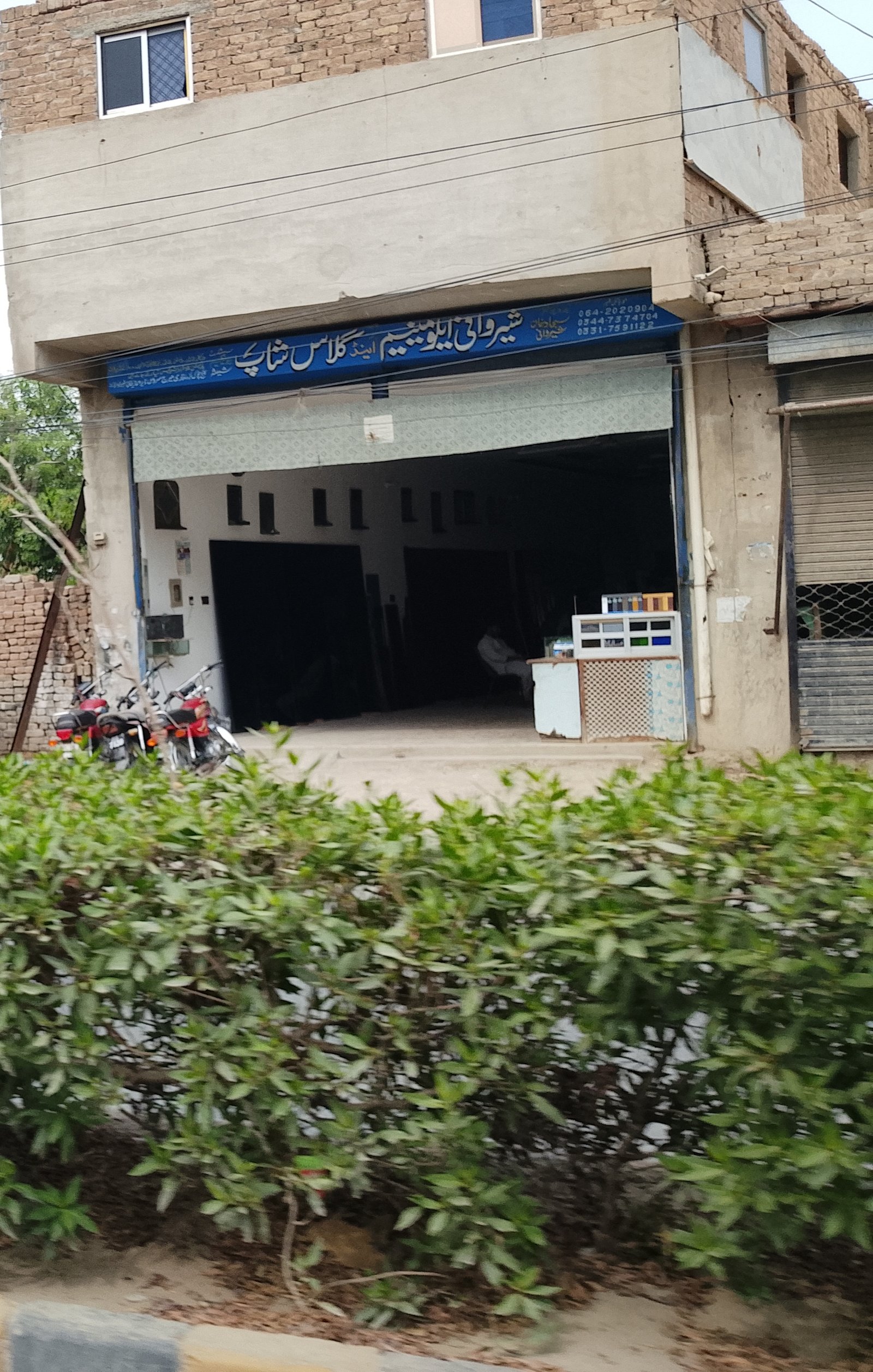 Sherwani aluminum and glass shop