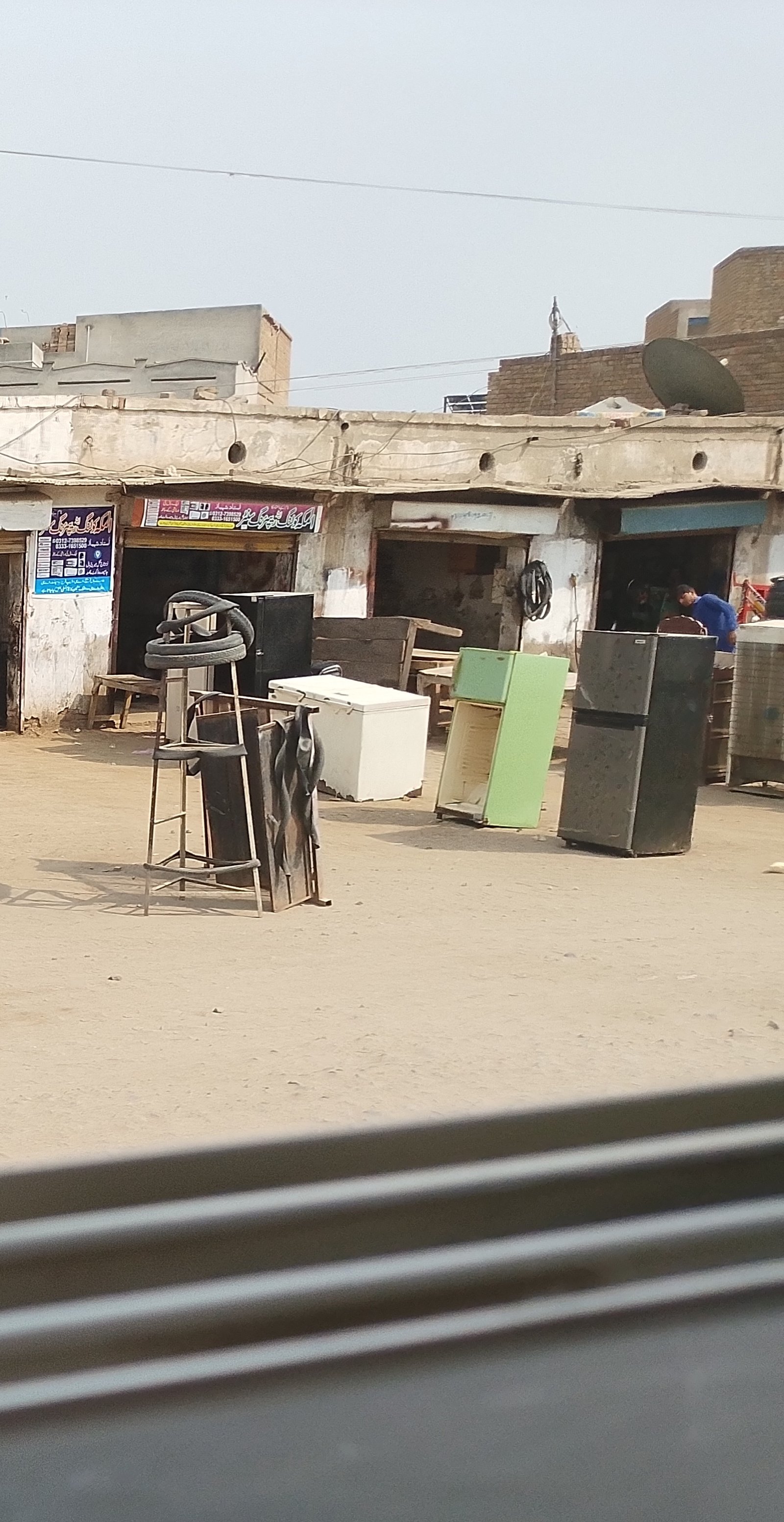 Al Makkah cooling and repairing center in kot chutta